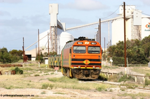 060113 2466
Thevenard, narrow gauge loco 1604 departs the yard with empty train 6DD3, 1604 leads a triple consist of Clyde Engineering built EMD JL22C model 1600 / NJ class combination of 1604 serial 71-731 and originally NJ 4, NJ 3 serial 71-730 and 1601 serial 71-728 the original class leader NJ 1, all three units started on the Central Australia Railway in 1971 and were transferred to the Eyre Peninsula in 1981. 1604 and 1601 both renumbered in 2004. January 13, 2006.
Keywords: 1600-class;1604;Clyde-Engineering-Granville-NSW;EMD;JL22C;71-731;NJ-class;NJ4;