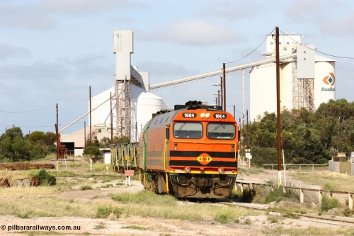 060113 2467
Thevenard, narrow gauge loco 1604 departs the yard with empty train 6DD3, 1604 leads a triple consist of Clyde Engineering built EMD JL22C model 1600 / NJ class combination of 1604 serial 71-731 and originally NJ 4, NJ 3 serial 71-730 and 1601 serial 71-728 the original class leader NJ 1, all three units started on the Central Australia Railway in 1971 and were transferred to the Eyre Peninsula in 1981. 1604 and 1601 both renumbered in 2004. January 13, 2006.
Keywords: 1600-class;1604;Clyde-Engineering-Granville-NSW;EMD;JL22C;71-731;NJ-class;NJ4;