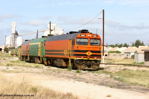 060113 2472
Thevenard, narrow gauge loco 1604 departs the yard with empty train 6DD3, 1604 leads a triple consist of Clyde Engineering built EMD JL22C model 1600 / NJ class combination of 1604 serial 71-731 and originally NJ 4, NJ 3 serial 71-730 and 1601 serial 71-728 the original class leader NJ 1, all three units started on the Central Australia Railway in 1971 and were transferred to the Eyre Peninsula in 1981. 1604 and 1601 both renumbered in 2004. January 13, 2006.
Keywords: 1600-class;1604;Clyde-Engineering-Granville-NSW;EMD;JL22C;71-731;NJ-class;NJ4;
