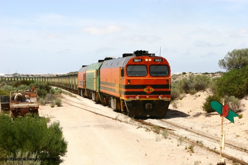 060113 2486
Kevin, ARG 1600 class narrow gauge loco 1604 a Clyde Engineering built EMD model JL22C serial 71-731, originally built for the Central Australia Railway in 1971, transferred to the Eyre Peninsula in 1981 arrives with empty gypsum train 6DD3. January 13, 2006.
Keywords: 1600-class;1604;Clyde-Engineering-Granville-NSW;EMD;JL22C;71-731;NJ-class;NJ4;