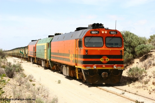 060113 2501
Kevin, empty train 6DD3 on the [url=https://goo.gl/maps/jZAuZ]stub of the now closed line to Penong[/url] shunts back onto the triangle leg to reverse the train prior to loading. January 13, 2006.
Keywords: 1600-class;1604;Clyde-Engineering-Granville-NSW;EMD;JL22C;71-731;NJ-class;NJ4;