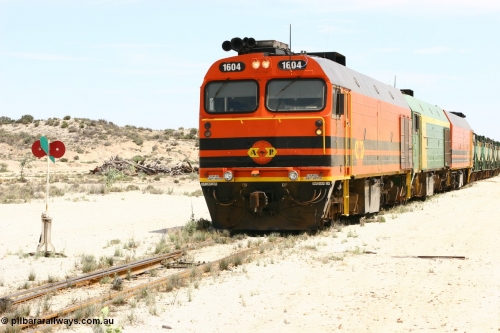 060113 2541
Kevin, narrow gauge locos 1604, NJ 3 and 1601 sit on the mainline to Penong, having reversed train 6DD3 on the Kevin triangle 1600 class unit 1604 in Australian Railroad Group livery a Clyde Engineering built EMD JL22C model serial 71-731, originally built as NJ class NJ 4 and built for the Central Australia Railway in 1971, transferred to the Eyre Peninsula in 1981. January 13, 2006.
Keywords: 1600-class;1604;Clyde-Engineering-Granville-NSW;EMD;JL22C;71-731;NJ-class;NJ4;