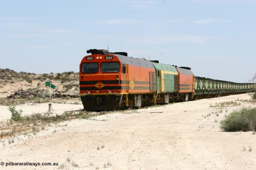 060113 2542
Kevin, with the points now set again for the mainline narrow gauge locos 1604, NJ 3 and 1601 sit on the mainline to Penong, having reversed train 6DD3 on the Kevin triangle 1600 class unit 1604 in Australian Railroad Group livery a Clyde Engineering built EMD JL22C model serial 71-731, originally built as NJ class NJ 4 and built for the Central Australia Railway in 1971, transferred to the Eyre Peninsula in 1981. January 13, 2006.
Keywords: 1600-class;1604;Clyde-Engineering-Granville-NSW;EMD;JL22C;71-731;NJ-class;NJ4;
