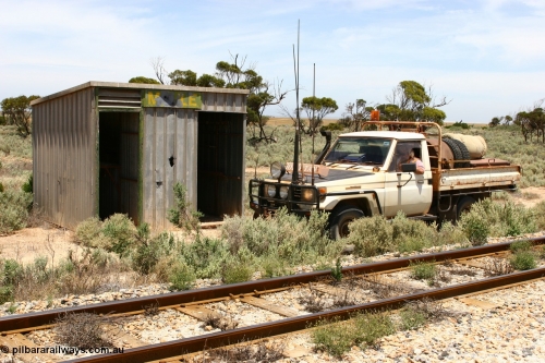 060113 2557
Charra at the 466.2 km, [url=https://goo.gl/maps/GpLTsHYeUymGtK5f7]Mallee style shelter building[/url]. Opened with the line on 13th February 1966 as a goods siding, reclassified as passing siding and extended, new goods loop siding constructed May 1982. January 13, 2006.
