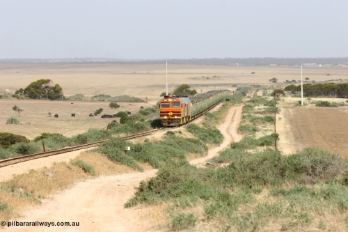 060113 2572
Ceduna, or Denial Bay area, empty gypsum train 6DD5 blasts up hill at the 440 km, crossing Carpenter Corner Rd with power from triple 1600/NJ class units 1604, NJ 3 and 1601. 1604 in Australian Railroad Group livery is a Clyde Engineering built EMD JL22C model serial 71-731, originally built as NJ class NJ 4. [url=https://goo.gl/maps/ULA2PjjKh6nhwHTdA]Location approximation[/url]. January 13, 2006.
Keywords: 1600-class;1604;Clyde-Engineering-Granville-NSW;EMD;JL22C;71-731;NJ-class;NJ4;