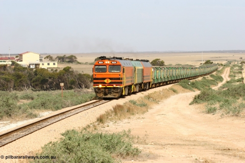 060113 2580
Ceduna, or Denial Bay area, empty gypsum train 6DD5 blasts up hill at the 440 km, west of Carpenter Corner Rd with power from triple 1600/NJ class units 1604, NJ 3 and 1601. 1604 in Australian Railroad Group livery is a Clyde Engineering built EMD JL22C model serial 71-731, originally built as NJ class NJ 4. [url=https://goo.gl/maps/ULA2PjjKh6nhwHTdA]Location approximation[/url]. January 13, 2006.
Keywords: 1600-class;1604;Clyde-Engineering-Granville-NSW;EMD;JL22C;71-731;NJ-class;NJ4;