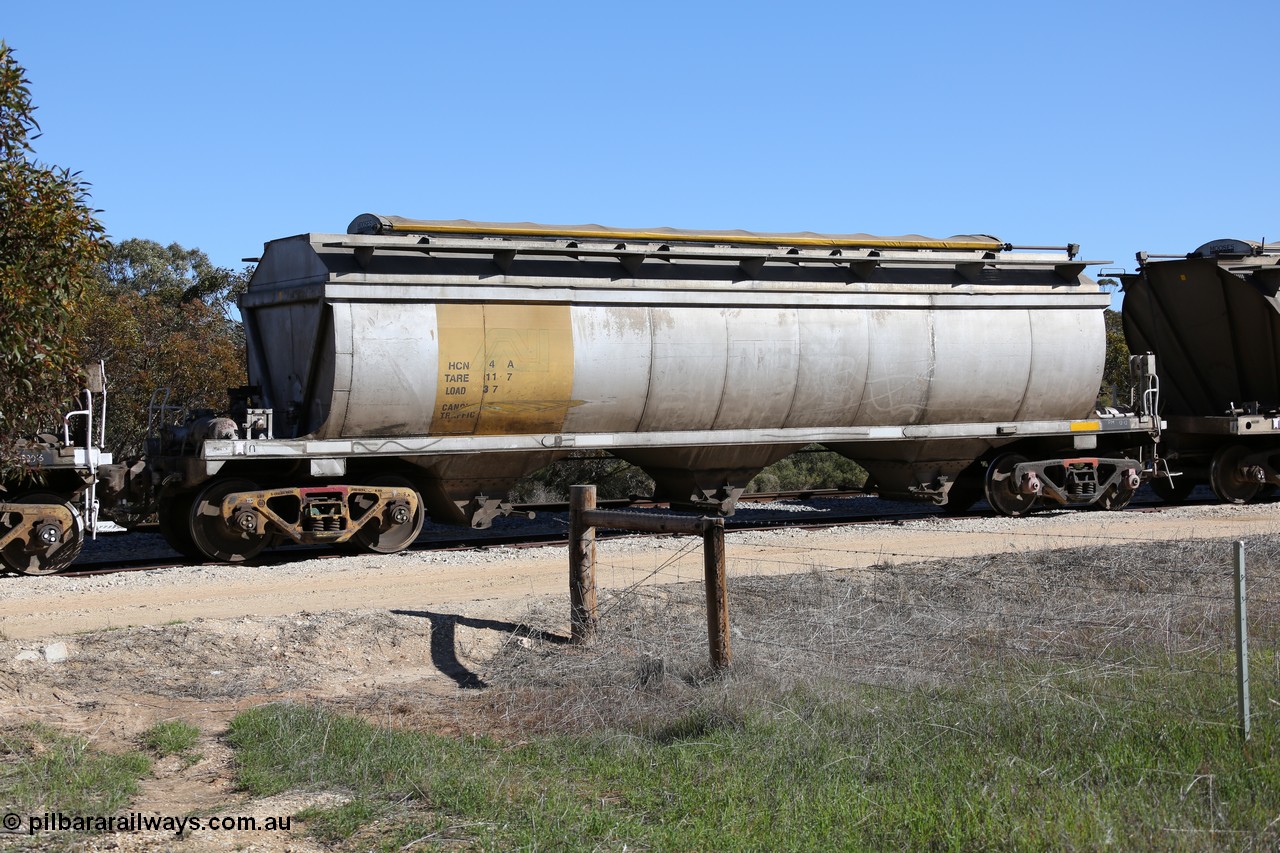 130703 0145
Murdinga, HCN type bogie grain hopper waggon HCN 4, originally an NHB type hopper built by Tulloch Ltd for the Commonwealth Railways North Australia Railway. One of forty rebuilt by Islington Workshops 1978-79 to the HCN type with a 36 ton rating, increased to 40 tonnes in 1984. Seen here loaded with grain with a Moose Metalworks roll-top cover.
Keywords: HCN-type;HCN4;SAR-Islington-WS;rebuild;Tulloch-Ltd-NSW;NHB-type;NHB1017;