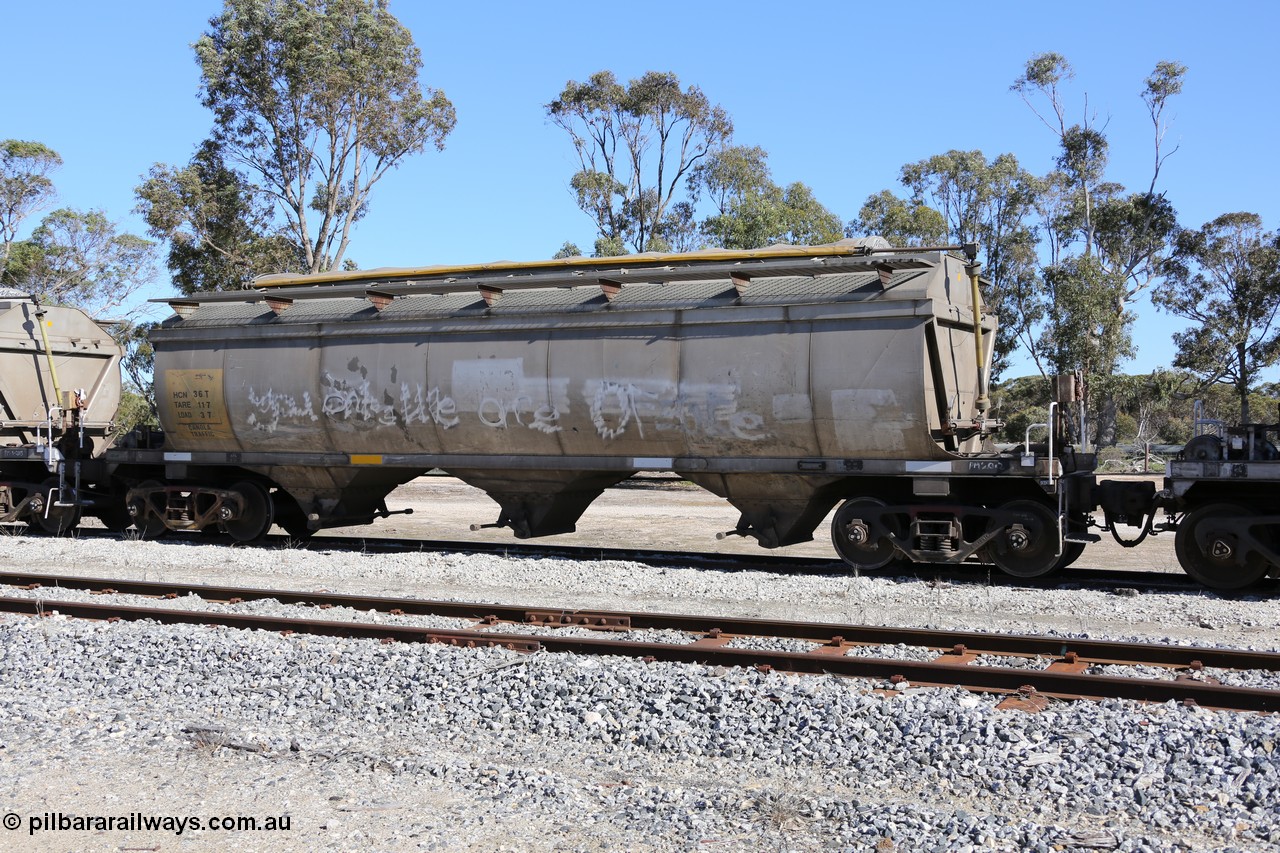 130703 0201
Tooligie, HCN type bogie grain hopper waggon HCN 36, originally an NHB type hopper built by Tulloch Ltd for the Commonwealth Railways North Australia Railway. One of forty rebuilt by Islington Workshops 1978-79 to the HCN type with a 36 ton rating, increased to 40 tonnes in 1984. Seen here loaded with grain with a Moose Metalworks roll-top cover.
Keywords: HCN-type;HCN36;SAR-Islington-WS;rebuild;Tulloch-Ltd-NSW;NHB-type;NHB1592;