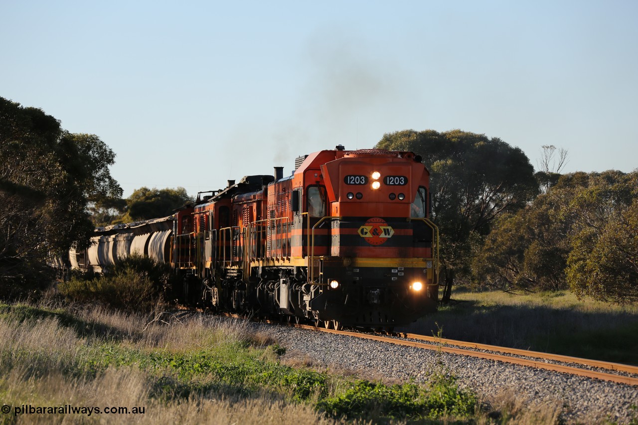 130703 0248
Kaldow, running south with the sun behind it is 1200 class 1204 a Clyde Engineering built EMD G12C model with serial 65-428 leading two ALCo units and was originally built in 1965 for Western Mining Corporation and operated by the WAGR as their A class A 1513. It came to the Eyre Peninsula in October 2004. [url=https://goo.gl/maps/FnDpXh45LbN7scrt5]Geo location[/url]. 3rd July 2013.
Keywords: 1200-class;1203;Clyde-Engineering-Granville-NSW;EMD;G12C;65-427;A-class;A1513;