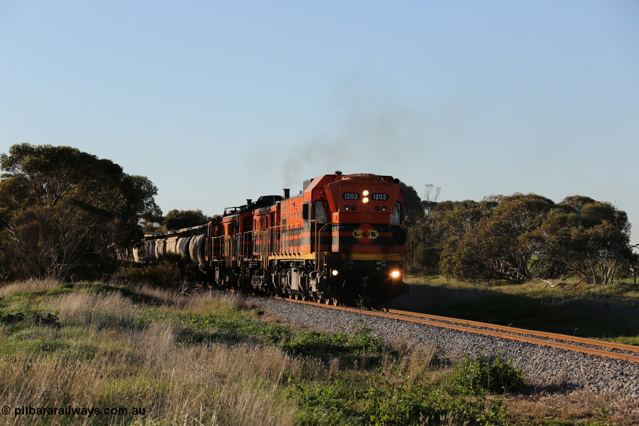 130703 0249
Kaldow, running south with the sun behind it is 1200 class 1204 a Clyde Engineering built EMD G12C model with serial 65-428 leading two ALCo units and was originally built in 1965 for Western Mining Corporation and operated by the WAGR as their A class A 1513. It came to the Eyre Peninsula in October 2004. [url=https://goo.gl/maps/FnDpXh45LbN7scrt5]Geo location[/url]. 3rd July 2013.
Keywords: 1200-class;1203;Clyde-Engineering-Granville-NSW;EMD;G12C;65-427;A-class;A1513;