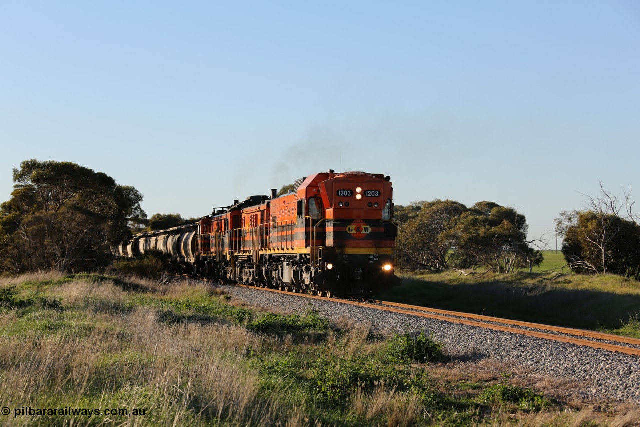 130703 0250
Kaldow, running south with the sun behind it is 1200 class 1204 a Clyde Engineering built EMD G12C model with serial 65-428 leading two ALCo units and was originally built in 1965 for Western Mining Corporation and operated by the WAGR as their A class A 1513. It came to the Eyre Peninsula in October 2004. [url=https://goo.gl/maps/FnDpXh45LbN7scrt5]Geo location[/url]. 3rd July 2013.
Keywords: 1200-class;1203;Clyde-Engineering-Granville-NSW;EMD;G12C;65-427;A-class;A1513;