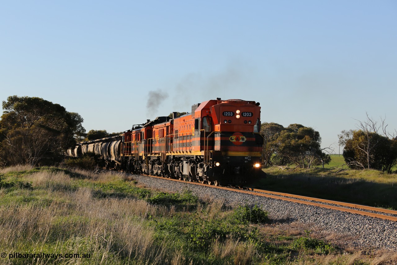 130703 0251
Kaldow, running south with the sun behind it is 1200 class 1204 a Clyde Engineering built EMD G12C model with serial 65-428 leading two ALCo units and was originally built in 1965 for Western Mining Corporation and operated by the WAGR as their A class A 1513. It came to the Eyre Peninsula in October 2004. [url=https://goo.gl/maps/FnDpXh45LbN7scrt5]Geo location[/url]. 3rd July 2013.
Keywords: 1200-class;1203;Clyde-Engineering-Granville-NSW;EMD;G12C;65-427;A-class;A1513;