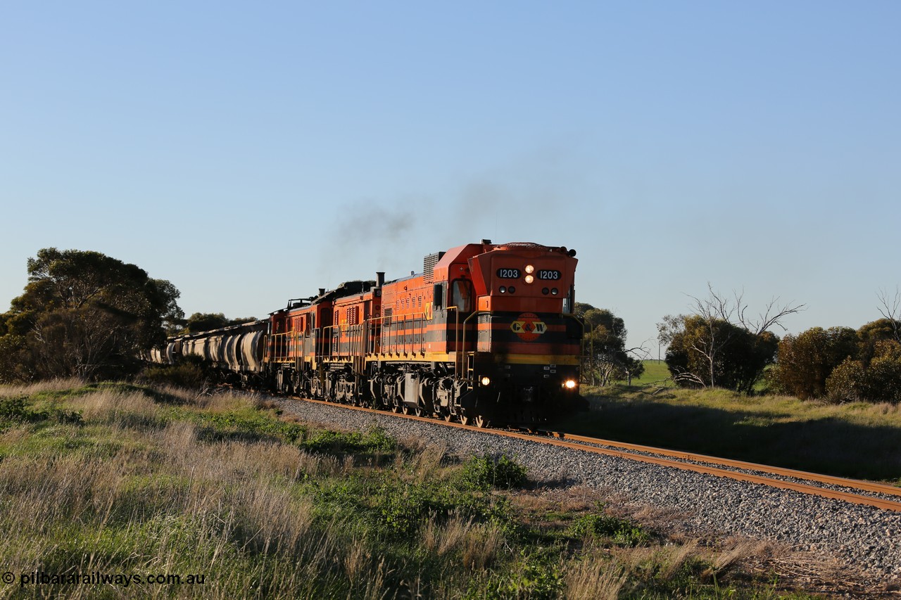 130703 0252
Kaldow, running south with the sun behind it is 1200 class 1204 a Clyde Engineering built EMD G12C model with serial 65-428 leading two ALCo units and was originally built in 1965 for Western Mining Corporation and operated by the WAGR as their A class A 1513. It came to the Eyre Peninsula in October 2004. [url=https://goo.gl/maps/FnDpXh45LbN7scrt5]Geo location[/url]. 3rd July 2013.
Keywords: 1200-class;1203;Clyde-Engineering-Granville-NSW;EMD;G12C;65-427;A-class;A1513;