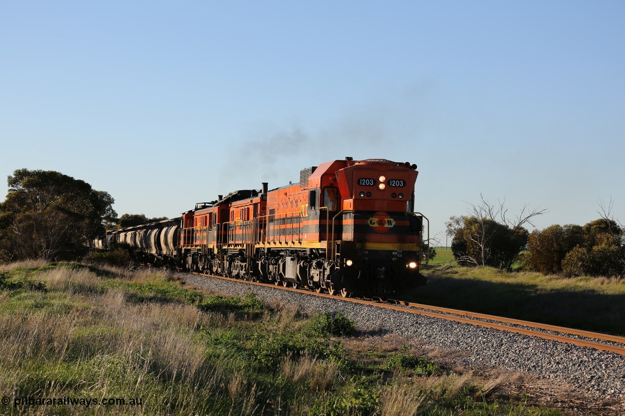 130703 0253
Kaldow, running south with the sun behind it is 1200 class 1204 a Clyde Engineering built EMD G12C model with serial 65-428 leading two ALCo units and was originally built in 1965 for Western Mining Corporation and operated by the WAGR as their A class A 1513. It came to the Eyre Peninsula in October 2004. [url=https://goo.gl/maps/FnDpXh45LbN7scrt5]Geo location[/url]. 3rd July 2013.
Keywords: 1200-class;1203;Clyde-Engineering-Granville-NSW;EMD;G12C;65-427;A-class;A1513;