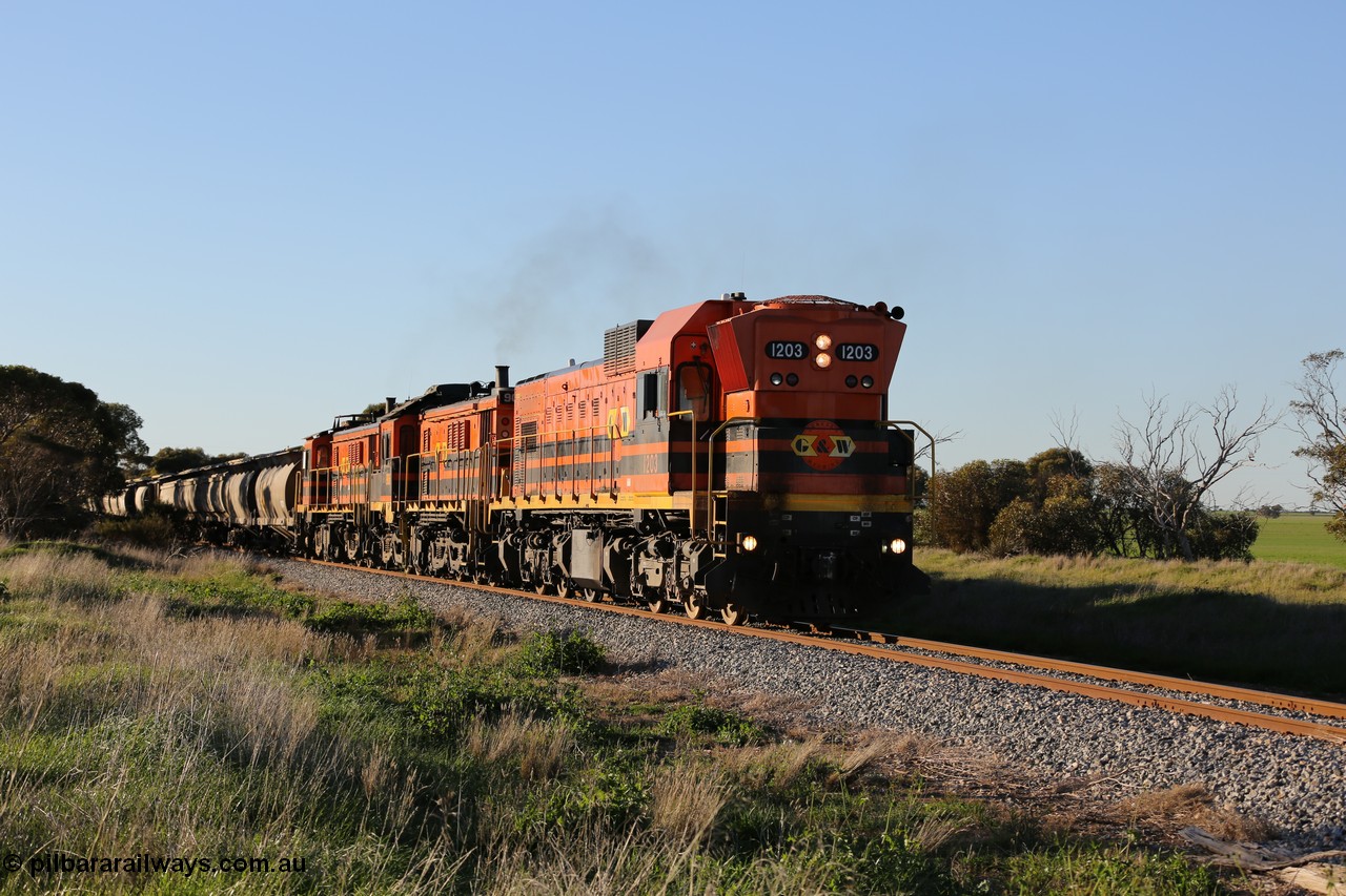 130703 0255
Kaldow, running south with the sun behind it is 1200 class 1204 a Clyde Engineering built EMD G12C model with serial 65-428 leading two ALCo units and was originally built in 1965 for Western Mining Corporation and operated by the WAGR as their A class A 1513. It came to the Eyre Peninsula in October 2004. [url=https://goo.gl/maps/FnDpXh45LbN7scrt5]Geo location[/url]. 3rd July 2013.
Keywords: 1200-class;1203;Clyde-Engineering-Granville-NSW;EMD;G12C;65-427;A-class;A1513;