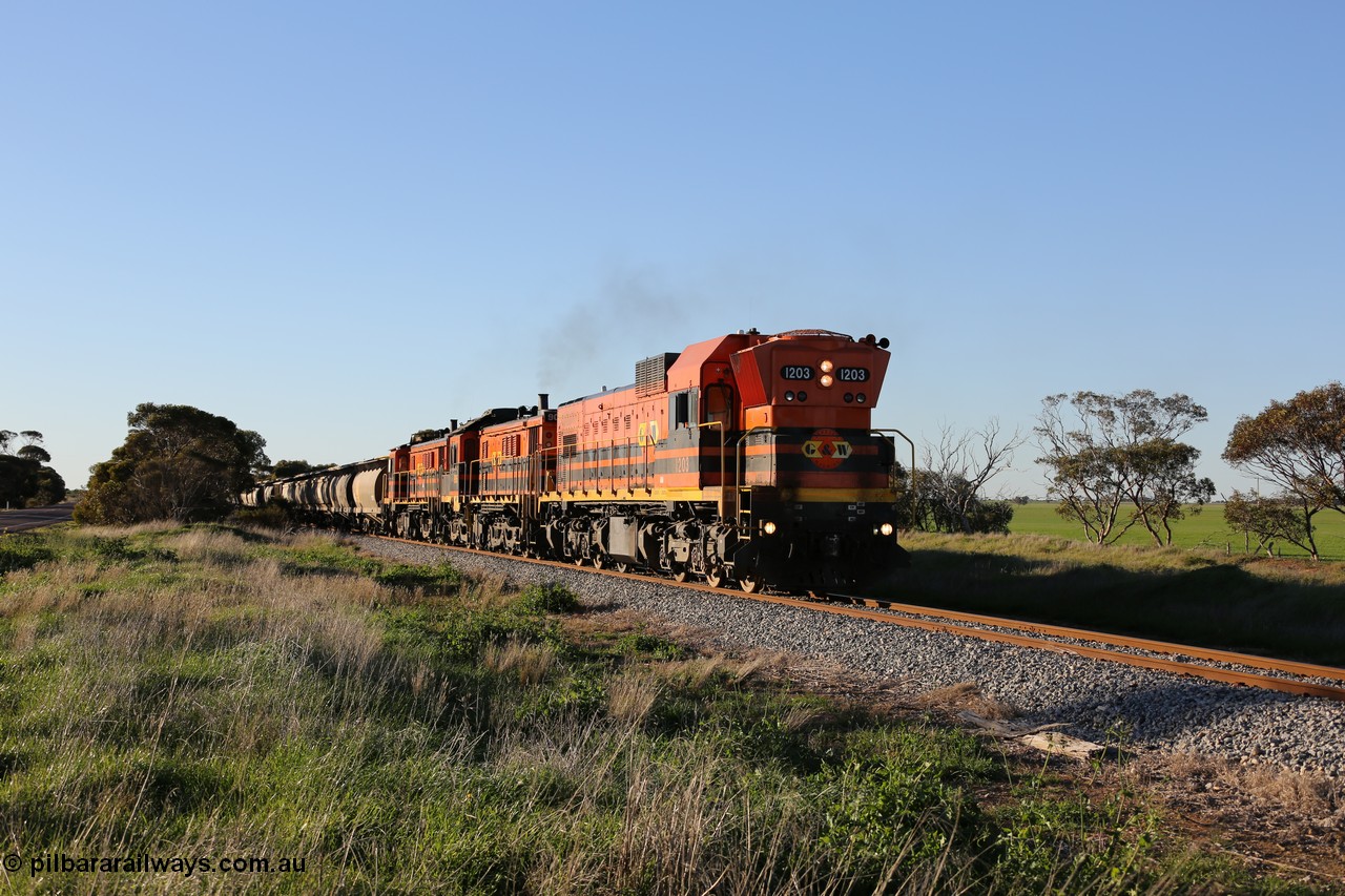 130703 0256
Kaldow, running south with the sun behind it is 1200 class 1204 a Clyde Engineering built EMD G12C model with serial 65-428 leading two ALCo units and was originally built in 1965 for Western Mining Corporation and operated by the WAGR as their A class A 1513. It came to the Eyre Peninsula in October 2004. [url=https://goo.gl/maps/FnDpXh45LbN7scrt5]Geo location[/url]. 3rd July 2013.
Keywords: 1200-class;1203;Clyde-Engineering-Granville-NSW;EMD;G12C;65-427;A-class;A1513;