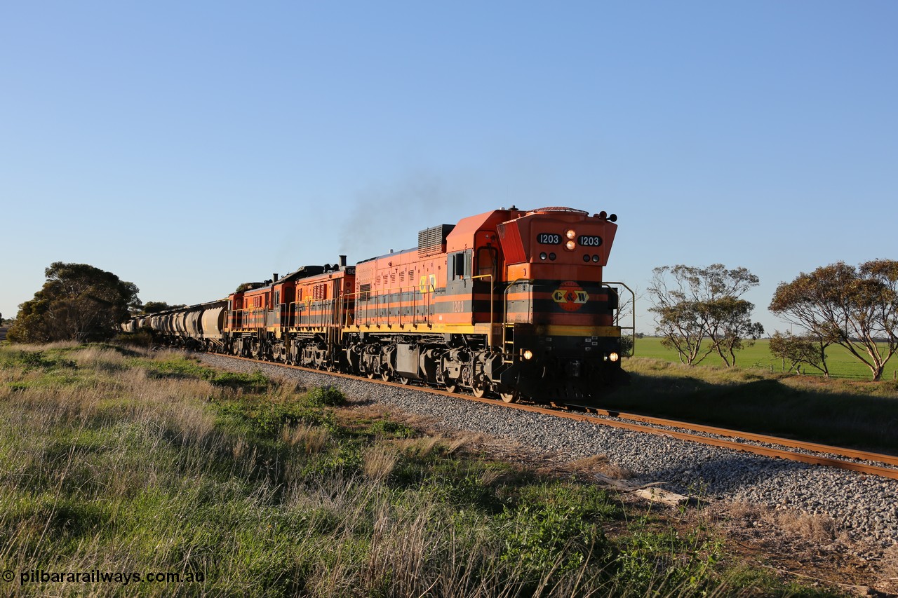 130703 0257
Kaldow, running south with the sun behind it is 1200 class 1204 a Clyde Engineering built EMD G12C model with serial 65-428 leading two ALCo units and was originally built in 1965 for Western Mining Corporation and operated by the WAGR as their A class A 1513. It came to the Eyre Peninsula in October 2004. [url=https://goo.gl/maps/FnDpXh45LbN7scrt5]Geo location[/url]. 3rd July 2013.
Keywords: 1200-class;1203;Clyde-Engineering-Granville-NSW;EMD;G12C;65-427;A-class;A1513;