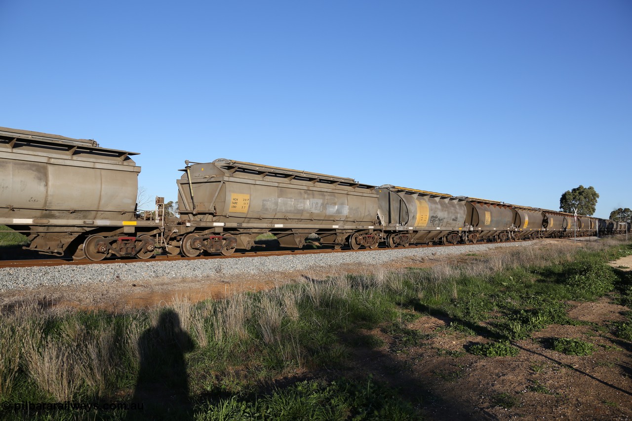 130703 0280
Kaldow, HCN type bogie grain hopper waggon HCN 29, originally an NHB type hopper built by Tulloch Ltd for the Commonwealth Railways North Australia Railway. One of forty rebuilt by Islington Workshops 1978-79 to the HCN type with a 36 ton rating, increased to 40 tonnes in 1984. Seen here loaded with grain with a Moose Metalworks roll-top cover.
Keywords: HCN-type;HCN29;SAR-Islington-WS;rebuild;Tulloch-Ltd-NSW;NHB-type;NHB1586;