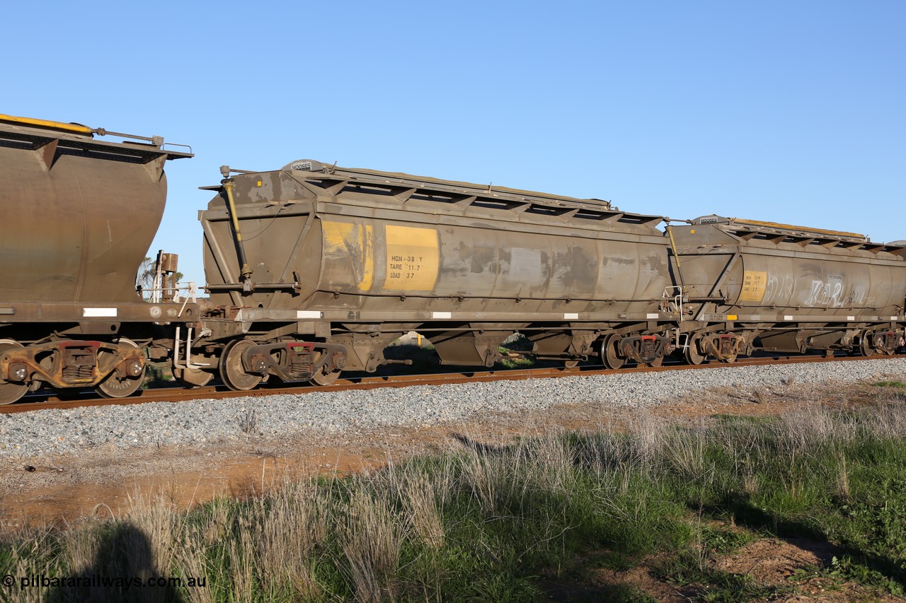 130703 0290
Kaldow, HCN type bogie grain hopper waggon HCN 38, originally an NHB type hopper built by Tulloch Ltd for the Commonwealth Railways North Australia Railway. One of forty rebuilt by Islington Workshops 1978-79 to the HCN type with a 36 ton rating, increased to 40 tonnes in 1984. Seen here loaded with grain with a Moose Metalworks roll-top cover.
Keywords: HCN-type;HCN38;SAR-Islington-WS;rebuild;Tulloch-Ltd-NSW;NHB-type;NHB1022;