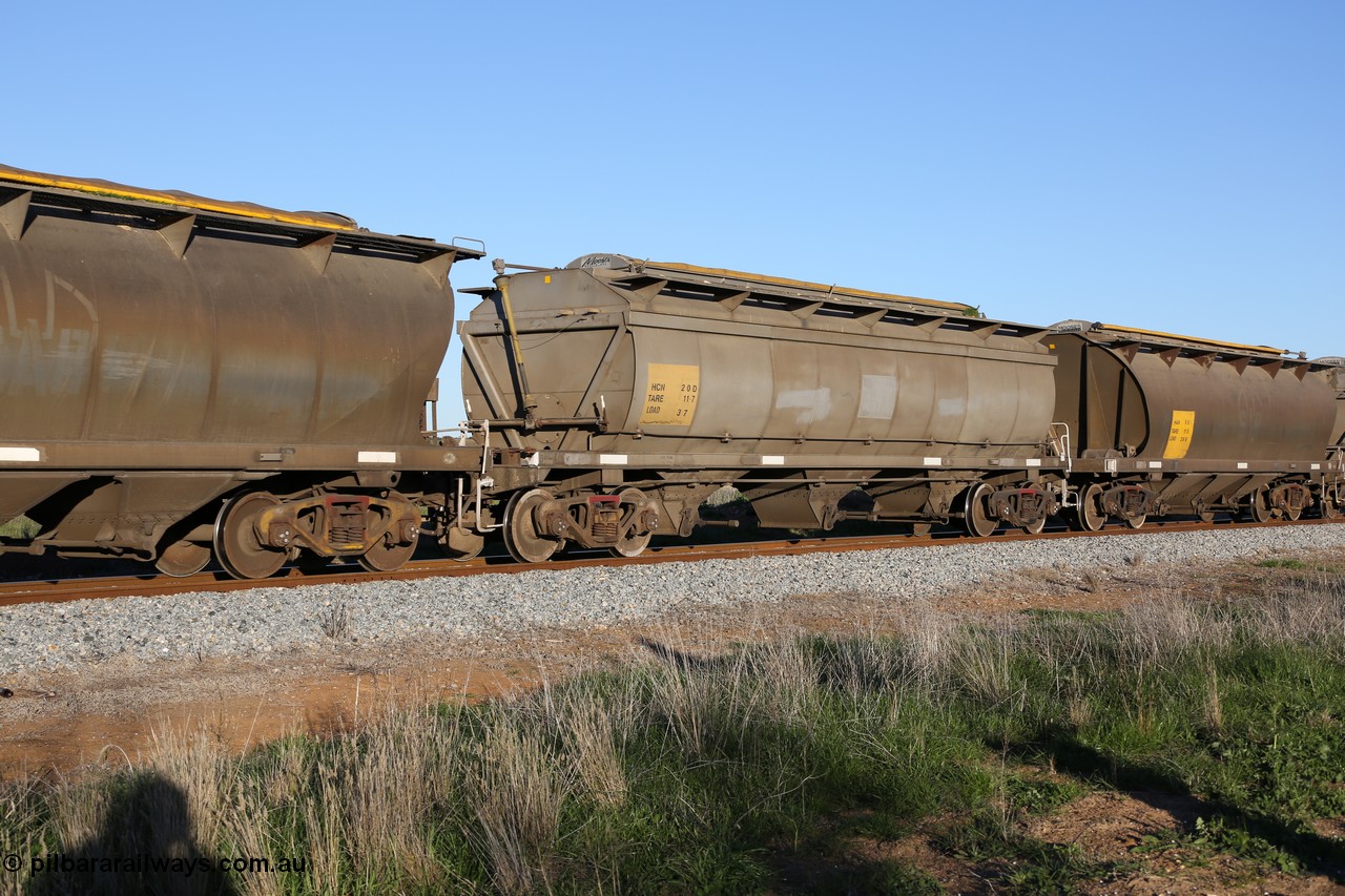 130703 0292
Kaldow, HCN type bogie grain hopper waggon HCN 20, originally an NHB type hopper built by Tulloch Ltd for the Commonwealth Railways North Australia Railway. One of forty rebuilt by Islington Workshops 1978-79 to the HCN type with a 36 ton rating, increased to 40 tonnes in 1984. Seen here loaded with grain with a Moose Metalworks roll-top cover.
Keywords: HCN-type;HCN20;SAR-Islington-WS;rebuild;Tulloch-Ltd-NSW;NHB-type;NHB1594;