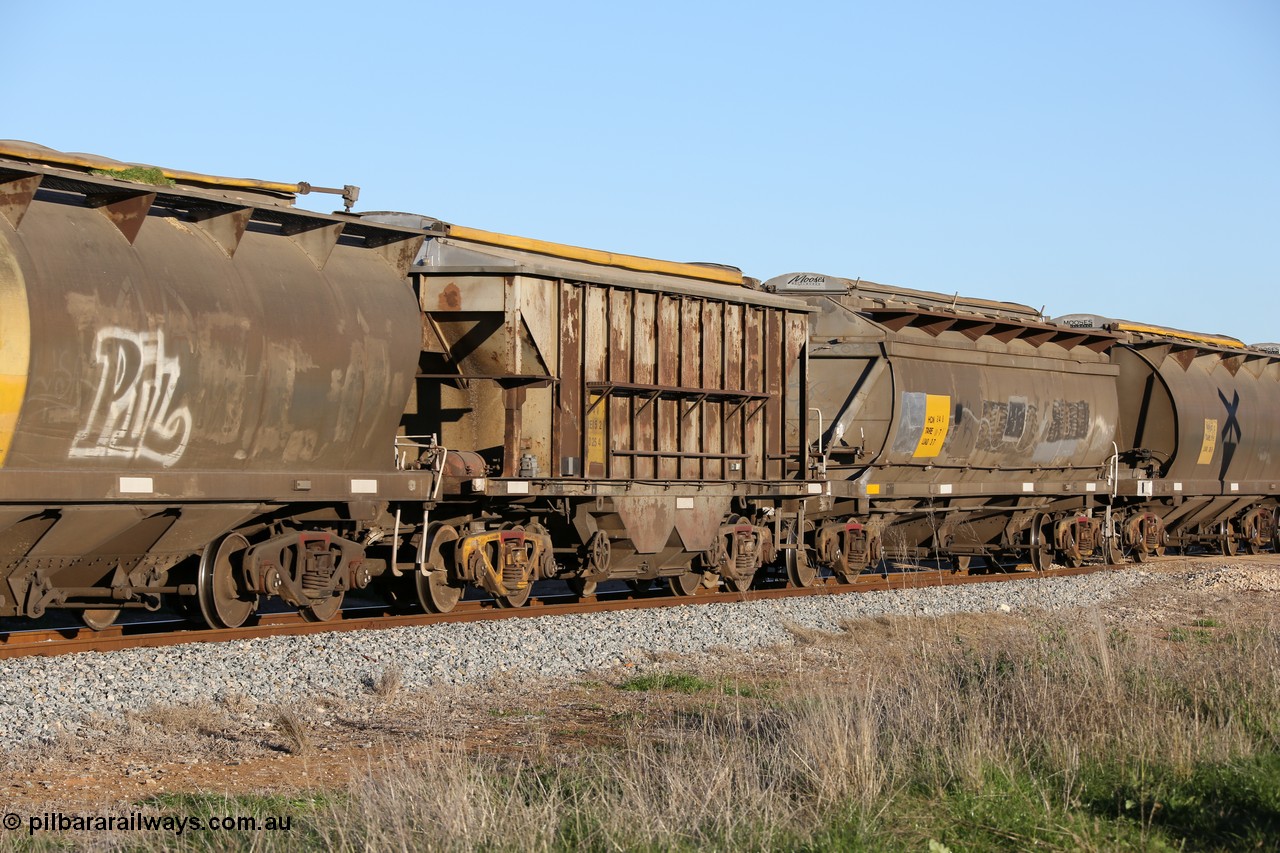 130703 0298
Kaldow, HBN type dual use ballast / grain hopper waggons, HBN 4 still with side gangways in place. One of seventeen built by South Australian Railways Islington Workshops in 1968 with a 25 ton capacity, increased to 34 tons in 1974. HBN 1-11 fitted with removable tops and roll-top hatches in 1999-2000.
Keywords: HBN-type;HBN4;1968/17-4;SAR-Islington-WS;