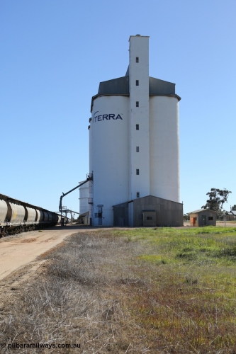 130703 0151
Murdinga, view looking north at the eight cell concrete silo complex built by SACBH with the Ascom silo visible behind and train being loaded in the siding. [url=https://goo.gl/maps/WFRgXQam4P4REFzu6]Geo location[/url]. July 3, 2006.
