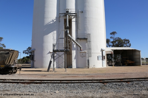 130703 0196
Tooligie, overview of the four cell concrete grain silo complex with the loading spout, dual unloading grids on the right where the shunting tractor is parked. [url=https://goo.gl/maps/6A5RxaKuZzx26s9j6]Geo location[/url]. July 3, 2006.
