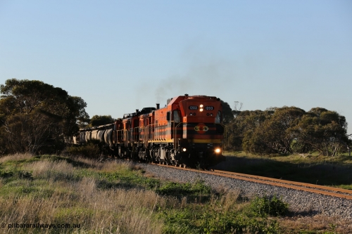 130703 0249
Kaldow, running south with the sun behind it is 1200 class 1204 a Clyde Engineering built EMD G12C model with serial 65-428 leading two ALCo units and was originally built in 1965 for Western Mining Corporation and operated by the WAGR as their A class A 1513. It came to the Eyre Peninsula in October 2004. [url=https://goo.gl/maps/FnDpXh45LbN7scrt5]Geo location[/url]. July 3, 2006.
Keywords: 1200-class;1203;Clyde-Engineering-Granville-NSW;EMD;G12C;65-427;A-class;A1513;
