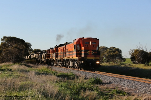 130703 0251
Kaldow, running south with the sun behind it is 1200 class 1204 a Clyde Engineering built EMD G12C model with serial 65-428 leading two ALCo units and was originally built in 1965 for Western Mining Corporation and operated by the WAGR as their A class A 1513. It came to the Eyre Peninsula in October 2004. [url=https://goo.gl/maps/FnDpXh45LbN7scrt5]Geo location[/url]. July 3, 2006.
Keywords: 1200-class;1203;Clyde-Engineering-Granville-NSW;EMD;G12C;65-427;A-class;A1513;