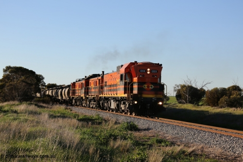 130703 0253
Kaldow, running south with the sun behind it is 1200 class 1204 a Clyde Engineering built EMD G12C model with serial 65-428 leading two ALCo units and was originally built in 1965 for Western Mining Corporation and operated by the WAGR as their A class A 1513. It came to the Eyre Peninsula in October 2004. [url=https://goo.gl/maps/FnDpXh45LbN7scrt5]Geo location[/url]. July 3, 2006.
Keywords: 1200-class;1203;Clyde-Engineering-Granville-NSW;EMD;G12C;65-427;A-class;A1513;
