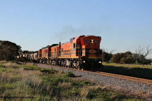 130703 0254
Kaldow, running south with the sun behind it is 1200 class 1204 a Clyde Engineering built EMD G12C model with serial 65-428 leading two ALCo units and was originally built in 1965 for Western Mining Corporation and operated by the WAGR as their A class A 1513. It came to the Eyre Peninsula in October 2004. [url=https://goo.gl/maps/FnDpXh45LbN7scrt5]Geo location[/url]. July 3, 2006.
Keywords: 1200-class;1203;Clyde-Engineering-Granville-NSW;EMD;G12C;65-427;A-class;A1513;