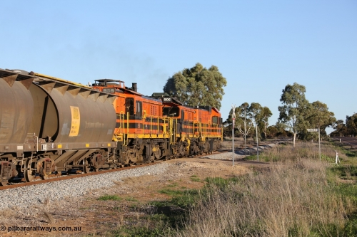 130703 0264
Kaldow, Port Lincoln bound loaded grain train crossing Loller Road grade crossing with EMD 1200 class 1204 leading two ALCo units, rebuilt 906 and 851. July 3, 2006.
