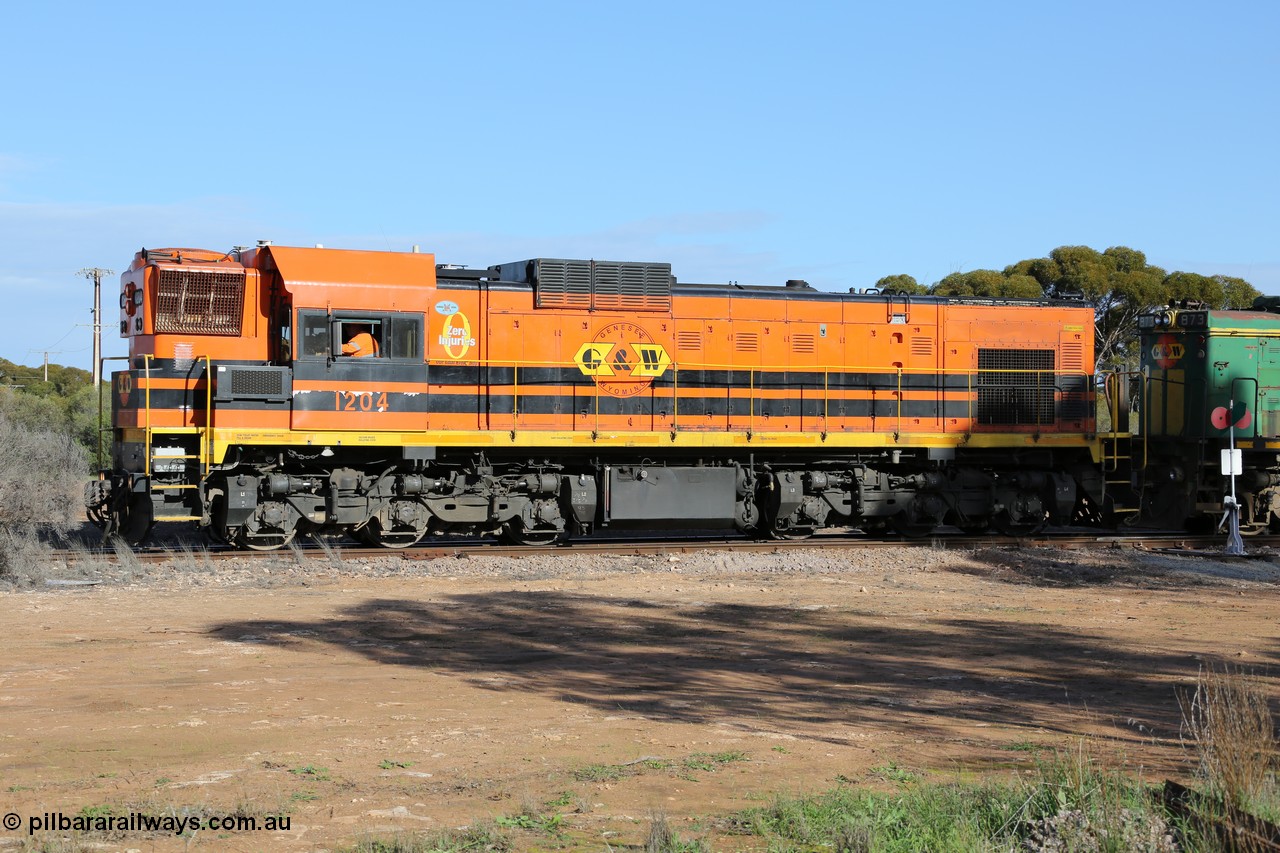 130704 0375
Kyancutta, 1200 class unit 1204 wearing current owner Genesee & Wyoming livery is a Clyde Engineering built EMD G12C model with serial 65-428 was originally built in 1965 for Western Mining Corporation and operated by the WAGR as their A class A 1514 recoded to 1204 in April 2004 and to the Eyre Peninsula in July 2004.
Keywords: 1200-class;1204;Clyde-Engineering-Granville-NSW;EMD;G12C;65-428;A-class;A1514;