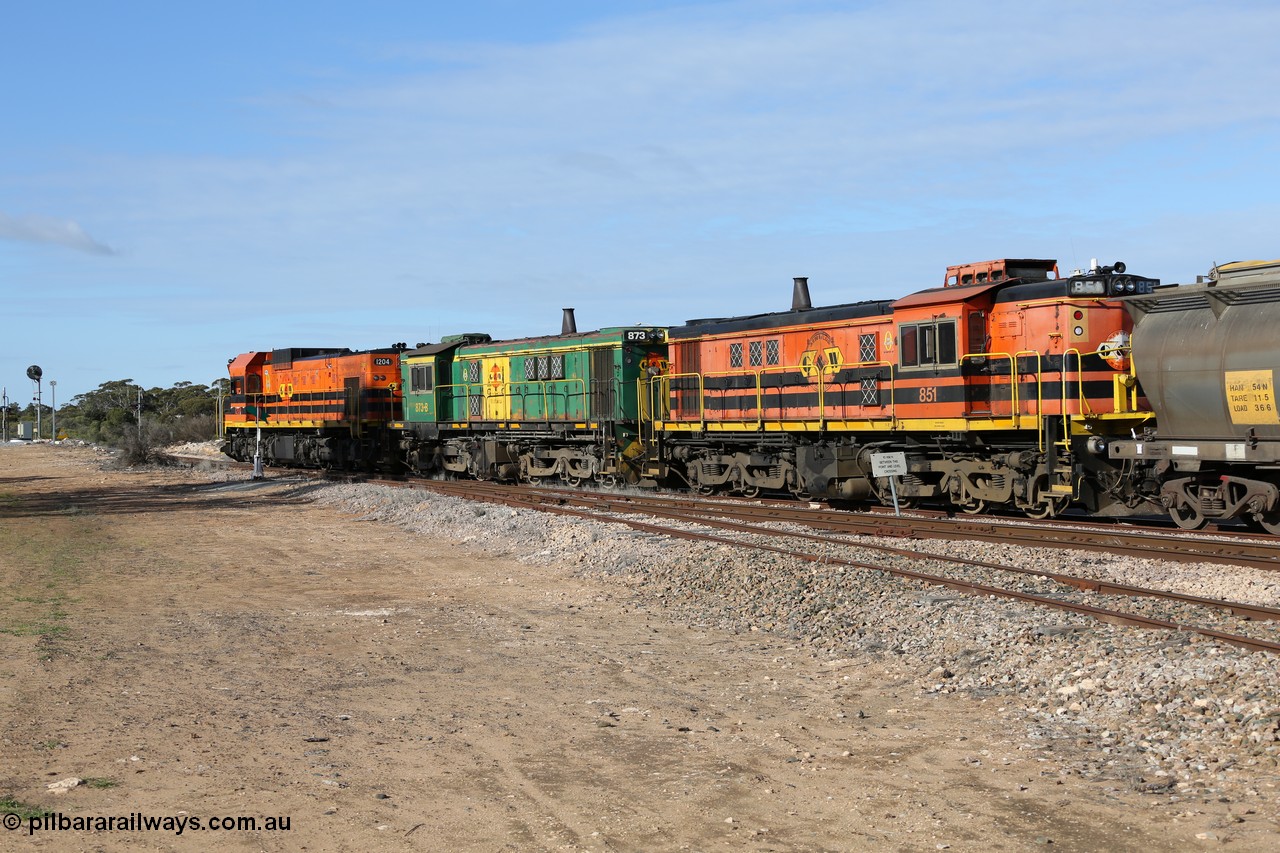 130704 0384
Kyancutta, south bound loaded grain train has stopped here to collect a loaded rack of grain waggons, seen here running out of the 'new grain siding' added in 1970 behind EMD 1204 and twin ALCo 830 units 873 and 851. 4th July 2013.
Keywords: 830-class;851;AE-Goodwin;ALCo;DL531;84137;