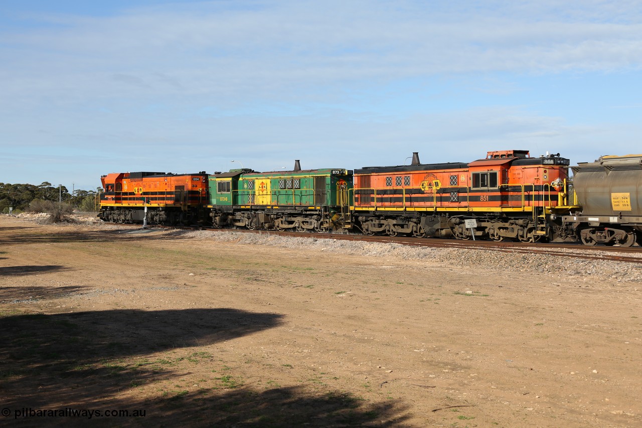 130704 0387
Kyancutta, south bound loaded grain train has stopped here to collect a loaded rack of grain waggons, seen here running out of the 'new grain siding' added in 1970 behind EMD 1204 and twin ALCo 830 units 873 and 851. 4th July 2013.
Keywords: 830-class;851;AE-Goodwin;ALCo;DL531;84137;