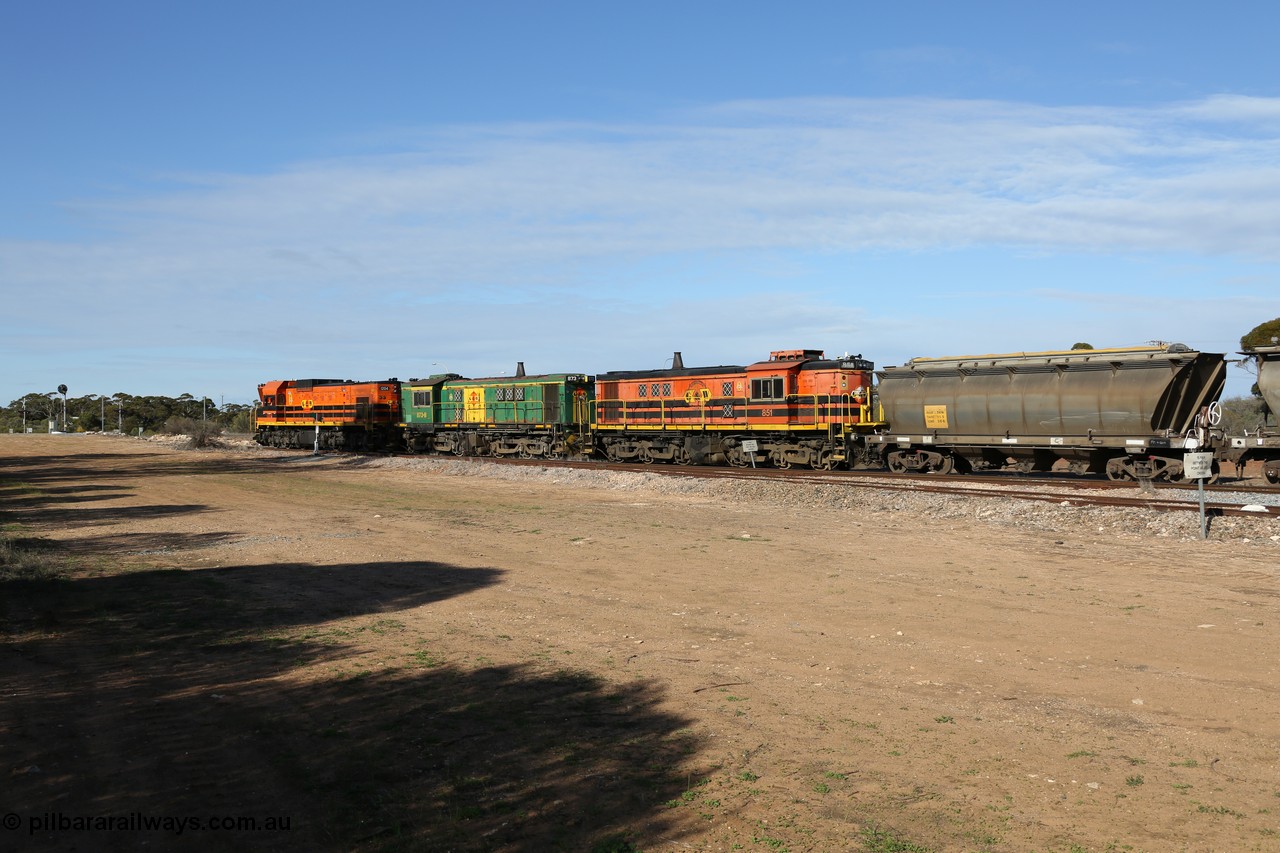 130704 0388
Kyancutta, south bound loaded grain train has stopped here to collect a loaded rack of grain waggons, seen here running out of the 'new grain siding' added in 1970 behind EMD 1204 and twin ALCo 830 units 873 and 851. 4th July 2013.
Keywords: 830-class;851;AE-Goodwin;ALCo;DL531;84137;