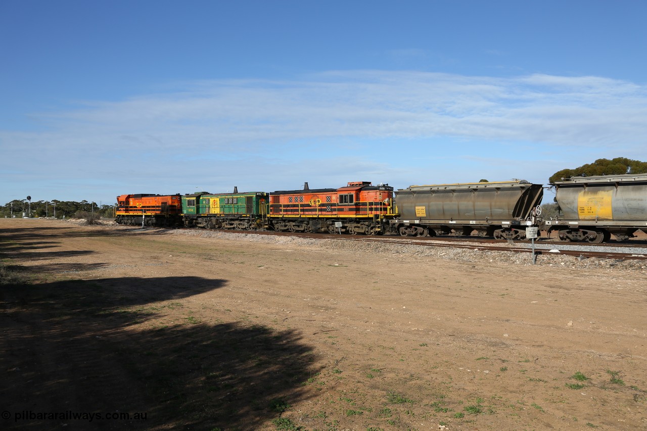 130704 0389
Kyancutta, south bound loaded grain train has stopped here to collect a loaded rack of grain waggons, seen here running out of the 'new grain siding' added in 1970 behind EMD 1204 and twin ALCo 830 units 873 and 851. 4th July 2013.
Keywords: 830-class;851;AE-Goodwin;ALCo;DL531;84137;