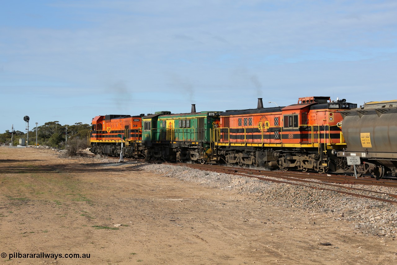 130704 0393
Kyancutta, south bound loaded grain train has stopped here to collect a loaded rack of grain waggons, seen here running out of the 'new grain siding' added in 1970 behind EMD 1204 and twin ALCo 830 units 873 and 851. 4th July 2013.
Keywords: 830-class;851;AE-Goodwin;ALCo;DL531;84137;