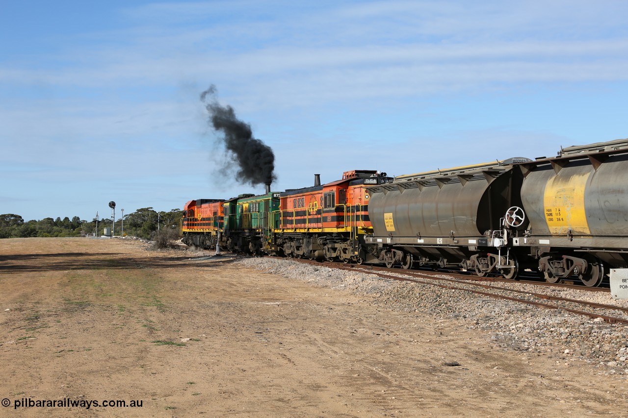 130704 0418
Kyancutta, south bound loaded grain train has stopped here to collect a loaded rack of grain waggons, seen here backing up to re-join the rest of the train on the mainline with one of only three electric signals on the network, behind EMD 1204 and twin ALCo 830 units 873 and 851. 4th July 2013.
Keywords: HAN-type;HAN54;1969-73/68-54;SAR-Islington-WS;