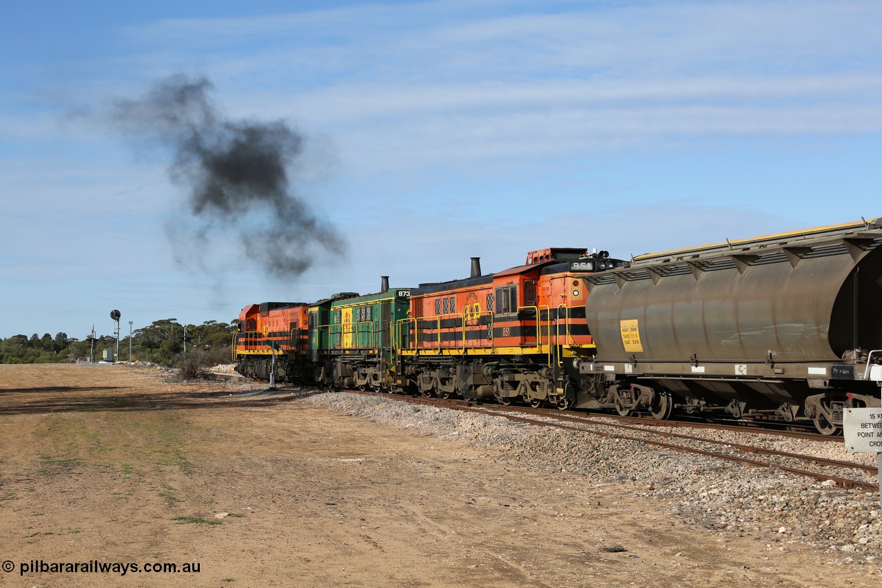 130704 0420
Kyancutta, south bound loaded grain train has stopped here to collect a loaded rack of grain waggons, seen here backing up to re-join the rest of the train on the mainline with one of only three electric signals on the network, behind EMD 1204 and twin ALCo 830 units 873 and 851. 4th July 2013.
Keywords: 830-class;851;AE-Goodwin;ALCo;DL531;84137;