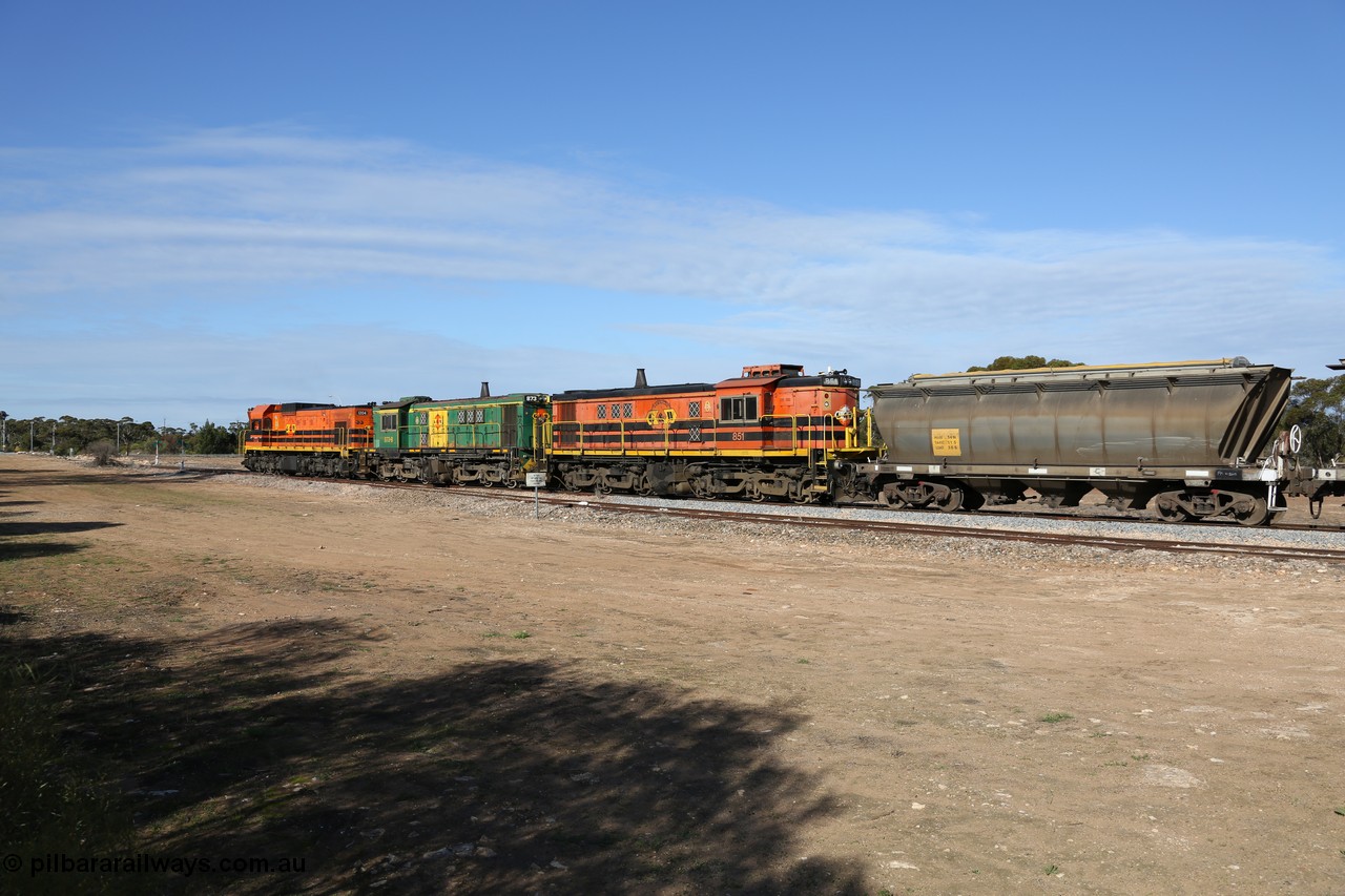 130704 0425
Kyancutta, south bound loaded grain train has stopped here to collect a loaded rack of grain waggons, seen here testing the brake after rejoining the train, with the original goods siding closest to the camera, behind EMD 1204 and twin ALCo 830 units 873 and 851. 4th July 2013.
Keywords: HAN-type;HAN54;1969-73/68-54;SAR-Islington-WS;