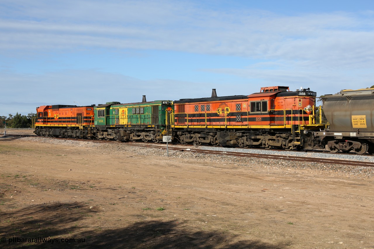 130704 0426
Kyancutta, south bound loaded grain train seen here testing the brake after picking up more loaded waggons and rejoining the train, with the original goods siding closest to the camera, behind 1200 class EMD G12C model 1204 and twin ALCo DL531 model 830 units 873 and 851. 4th July 2013.
Keywords: 830-class;851;AE-Goodwin;ALCo;DL531;84137;