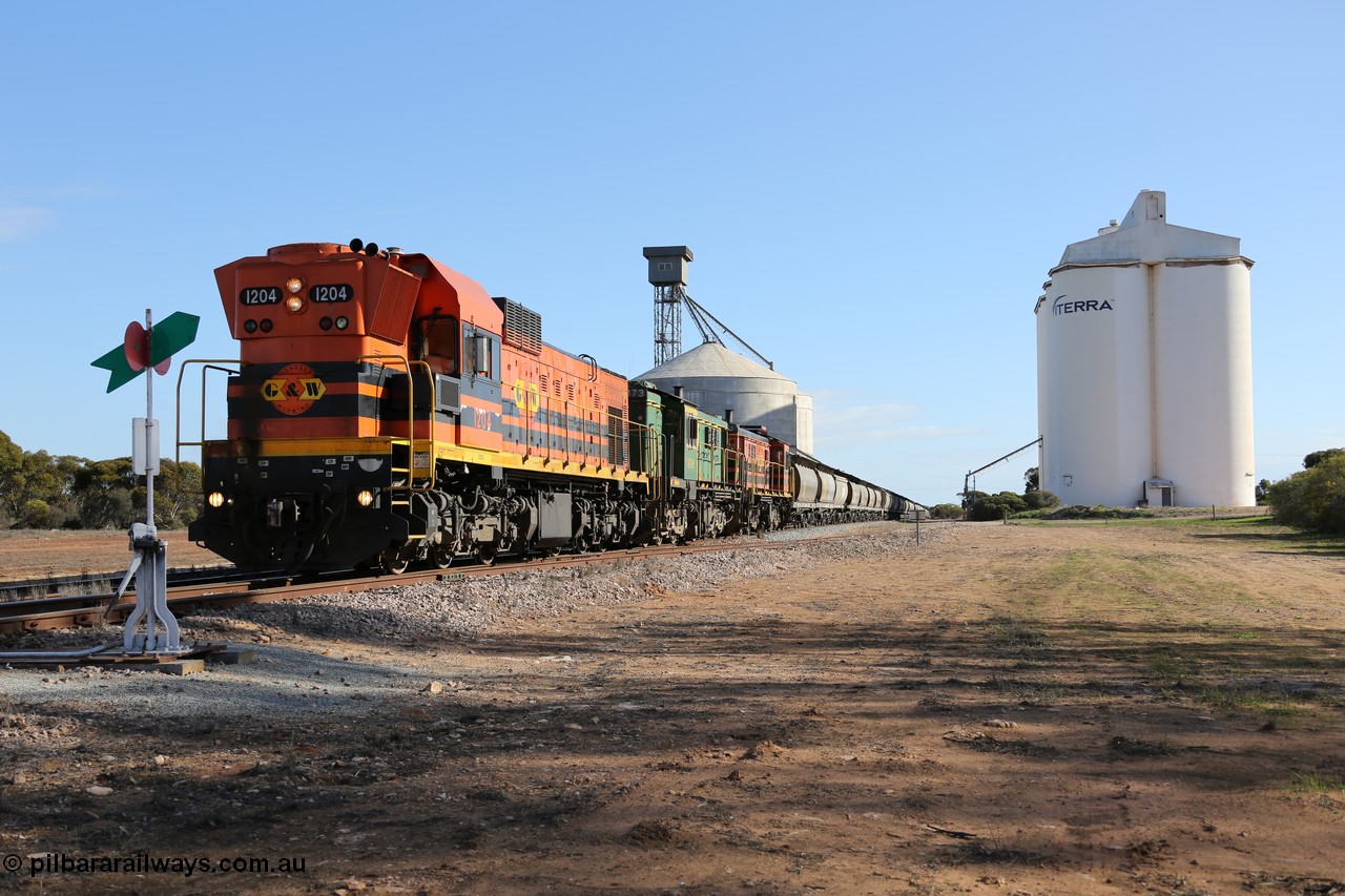 130704 0430
Kyancutta, 1200 class unit 1204 wearing current owner Genesee & Wyoming livery is a Clyde Engineering built EMD G12C model with serial 65-428 heads up a loaded grain train as it undertakes a brake test following shunting to attach a further fourteen waggons. 4th July 2013.
Keywords: 1200-class;1204;Clyde-Engineering-Granville-NSW;EMD;G12C;65-428;A-class;A1514;