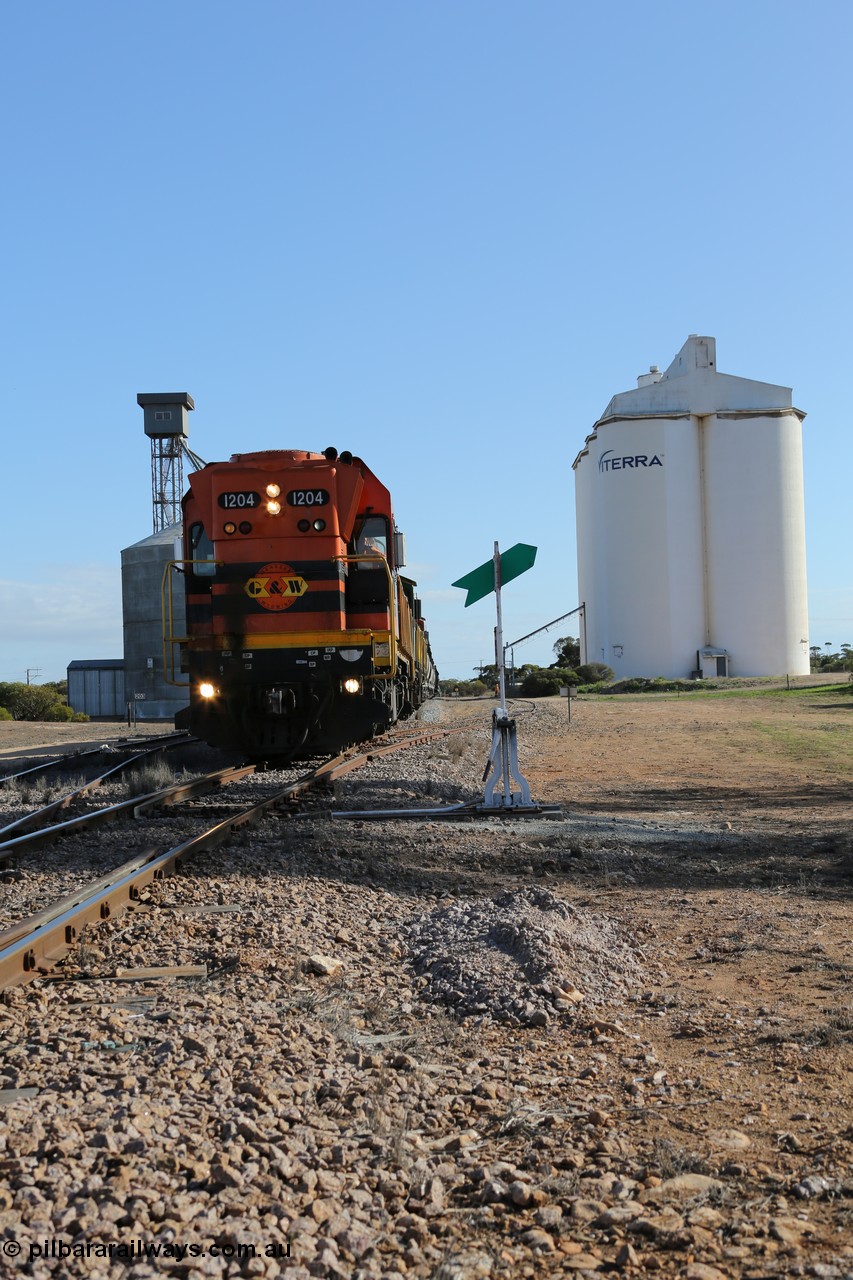 130704 0432
Kyancutta, 1200 class unit 1204 wearing current owner Genesee & Wyoming livery is a Clyde Engineering built EMD G12C model with serial 65-428 heads up a loaded grain train as it undertakes a brake test following shunting to attach a further fourteen waggons. 4th July 2013.
Keywords: 1200-class;1204;Clyde-Engineering-Granville-NSW;EMD;G12C;65-428;A-class;A1514;