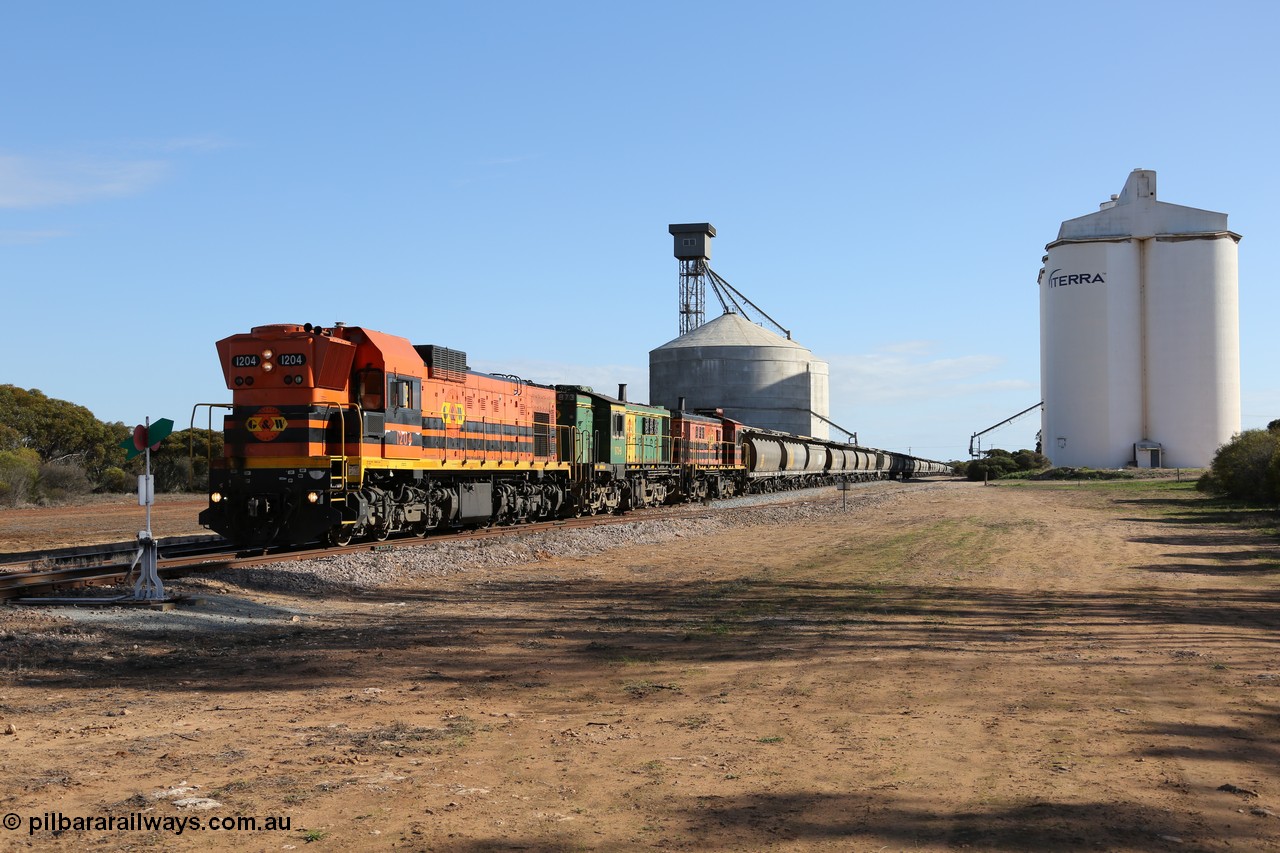 130704 0434
Kyancutta, 1200 class unit 1204 wearing current owner Genesee & Wyoming livery is a Clyde Engineering built EMD G12C model with serial 65-428 heads up a loaded grain train as it undertakes a brake test following shunting to attach a further fourteen waggons. 4th July 2013.
Keywords: 1200-class;1204;Clyde-Engineering-Granville-NSW;EMD;G12C;65-428;A-class;A1514;