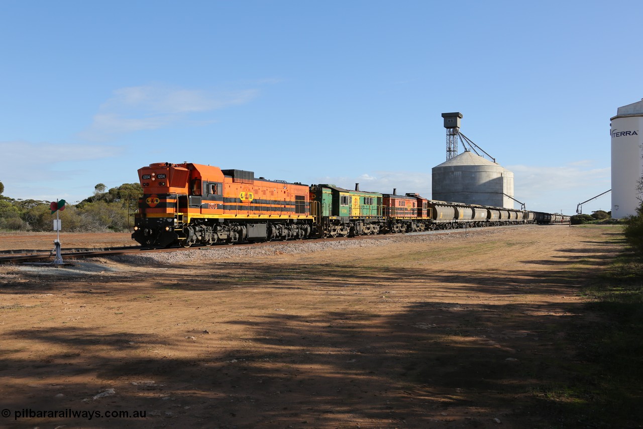 130704 0435
Kyancutta, 1200 class unit 1204 wearing current owner Genesee & Wyoming livery is a Clyde Engineering built EMD G12C model with serial 65-428 heads up a loaded grain train as it undertakes a brake test following shunting to attach a further fourteen waggons. 4th July 2013.
Keywords: 1200-class;1204;Clyde-Engineering-Granville-NSW;EMD;G12C;65-428;A-class;A1514;