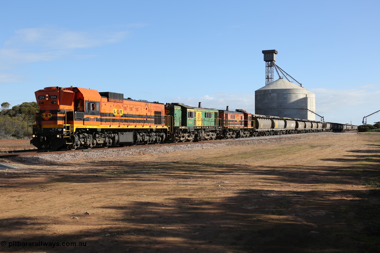 130704 0436
Kyancutta, 1200 class unit 1204 wearing current owner Genesee & Wyoming livery is a Clyde Engineering built EMD G12C model with serial 65-428 heads up a loaded grain train as it undertakes a brake test following shunting to attach a further fourteen waggons. 4th July 2013.
Keywords: 1200-class;1204;Clyde-Engineering-Granville-NSW;EMD;G12C;65-428;A-class;A1514;