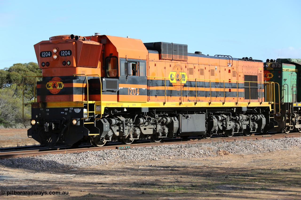 130704 0437
Kyancutta, 1200 class unit 1204 wearing current owner Genesee & Wyoming livery is a Clyde Engineering built EMD G12C model with serial 65-428 was originally built in 1965 for Western Mining Corporation and operated by the WAGR as their A class A 1514 recoded to 1204 in April 2004 and to the Eyre Peninsula in July 2004.
Keywords: 1200-class;1204;Clyde-Engineering-Granville-NSW;EMD;G12C;65-428;A-class;A1514;