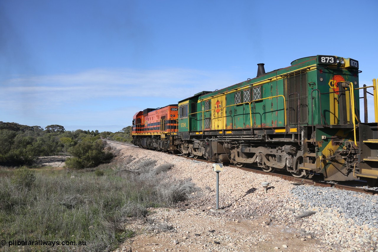 130704 0448
Kyancutta, second unit former Australian National narrow gauge 830 class locomotive 873, an AE Goodwin built ALCo DL531 model with serial G3422-3 built new for the SAR in 1966 and delivered new to Port Lincoln in April 1966 with current owner decals for G&W, it has spent it's whole working life on the Eyre Peninsula. 4th July 2013.
Keywords: 830-class;873;G3422-3;AE-Goodwin;ALCo;DL531;