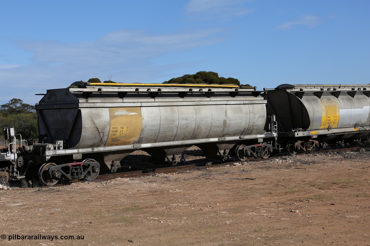 130704 0452
Kyancutta, HCN type bogie grain hopper waggon HCN 16, originally an NHB type hopper built by Tulloch Ltd for the Commonwealth Railways North Australia Railway. One of forty rebuilt by Islington Workshops 1978-79 to the HCN type with a 36 ton rating, increased to 40 tonnes in 1984. Seen here loaded with grain with a Moose Metalworks roll-top cover.
Keywords: HCN-type;HCN16;SAR-Islington-WS;rebuild;Tulloch-Ltd-NSW;NHB-type;NHB1599;